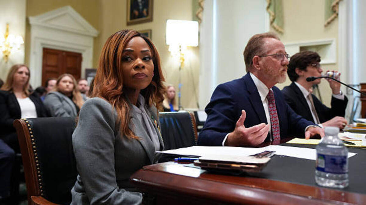 U.S. Rep. Sheila Cherfilus-McCormick appears at a hearing of the House Ethics Committee on Capitol Hill on March 26 in Washington, D.C. Her attorney, William Barzee, addresses the committee.