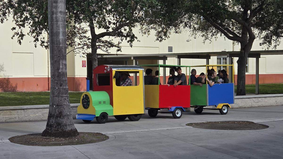 A train took students for a ride around Glades Middle School's courtyard while the Winter Wonderland party happened inside the gym.