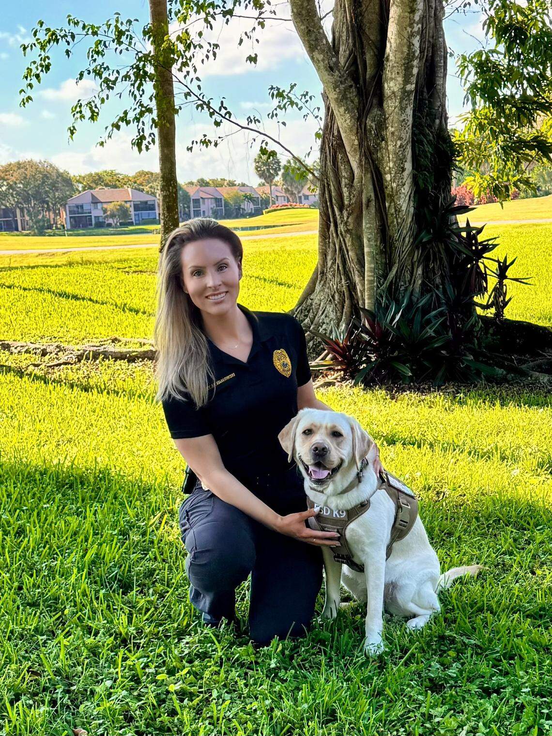 Delila and her handler, Miramar Det. Melinda Kimkowski.