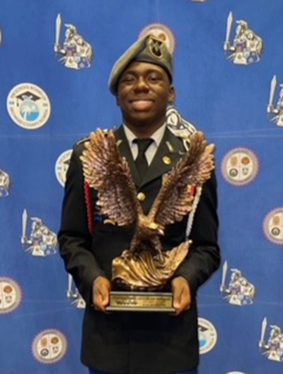 Everglades High School senior Steve Joseph earned a ceremonial eagle trophy and a $2,000 scholarship as Cadet of the Year.