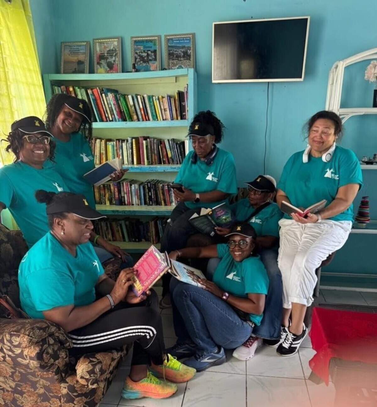 Jamaican Women of Florida members served Melody House in their library and helped repaint the building.