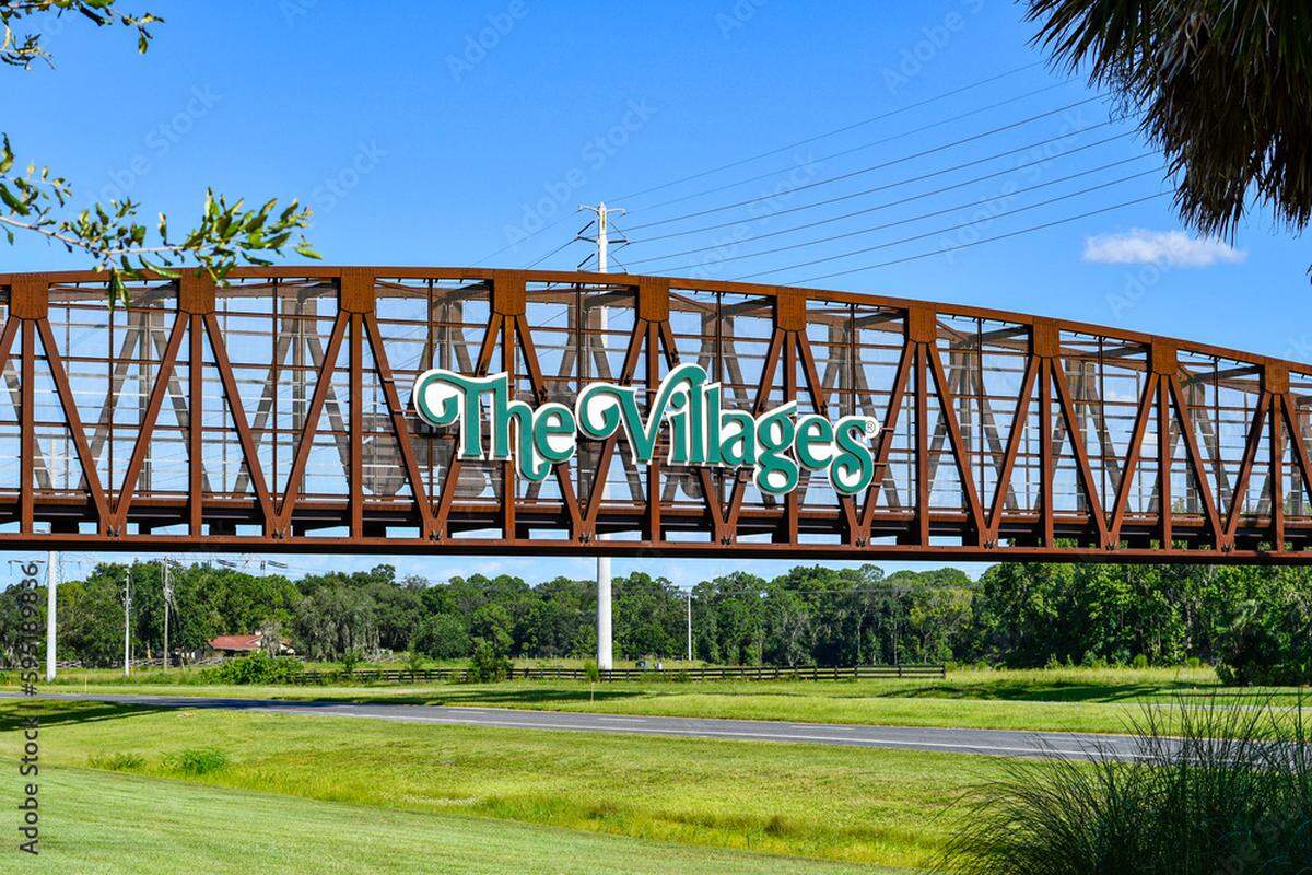 Miramar Mayor Wayne M. Messam would like to see a sign like this one alerting motorists on Miramar Parkway they are within Miramar’s city limits. Shown is a sign for The Villages attached to an overpass bridge.